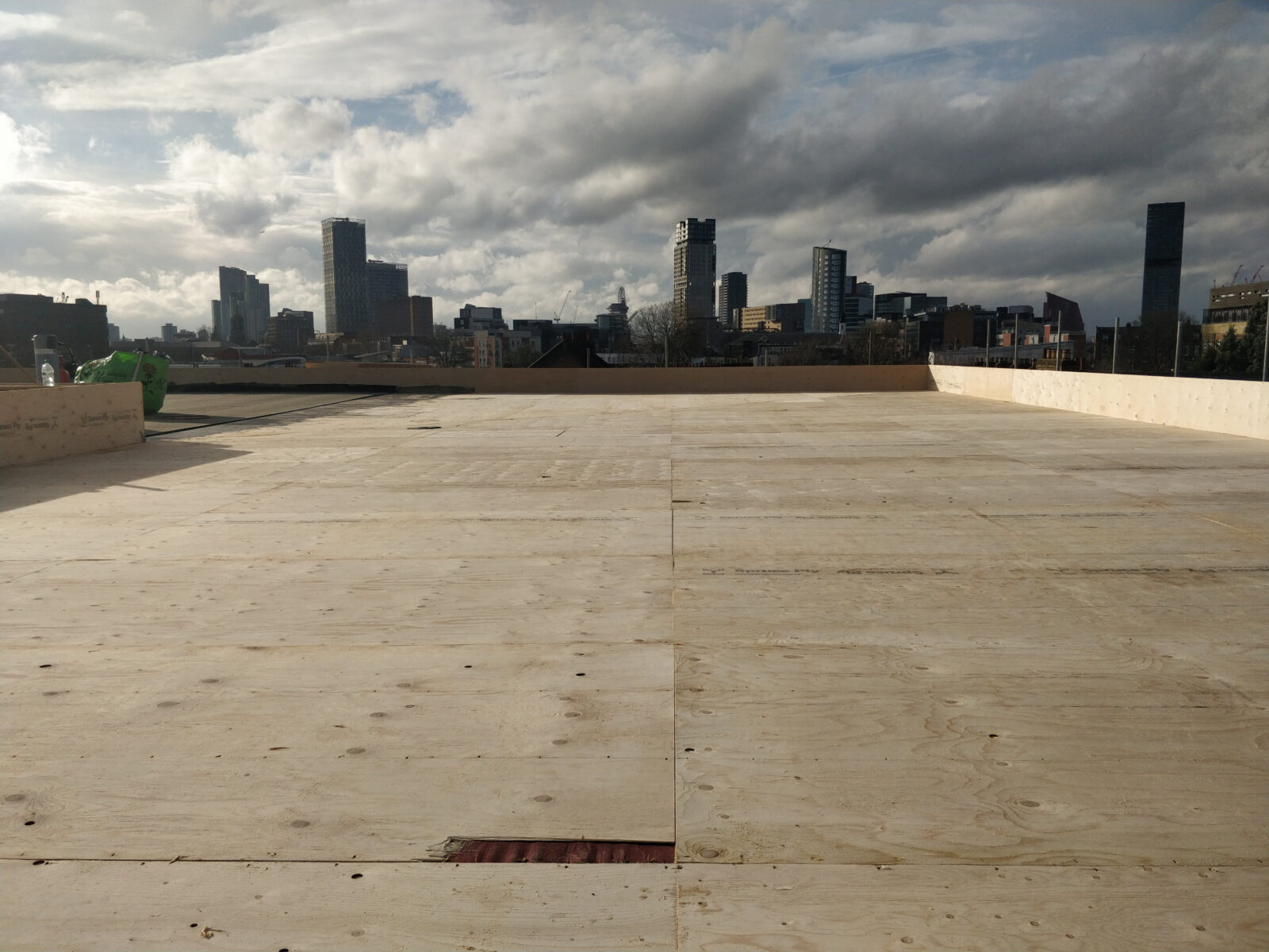 Completed timber roof of Water Lane development with view towards Stratford