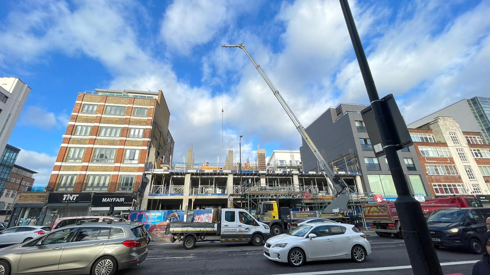 Photo of construction site with building of the structural frame